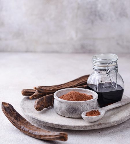 Carob pods, powder and molasses or syrup. Organic natural cocoa substitute